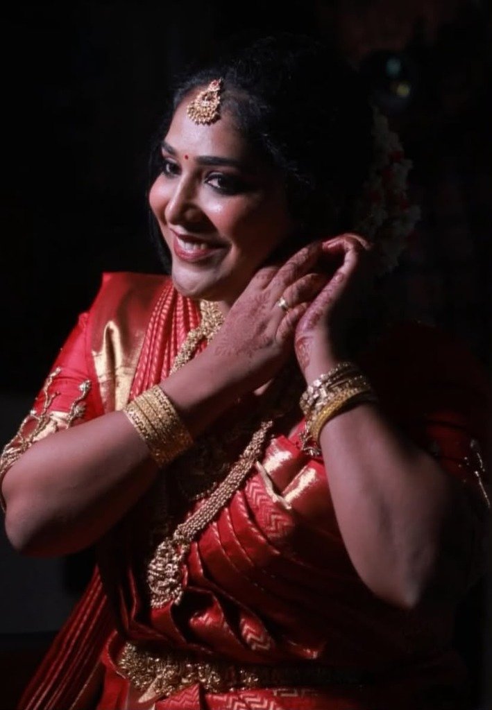Crimson Red Saree Earring Detail — Bridal work by Varnam Makeover Studio
